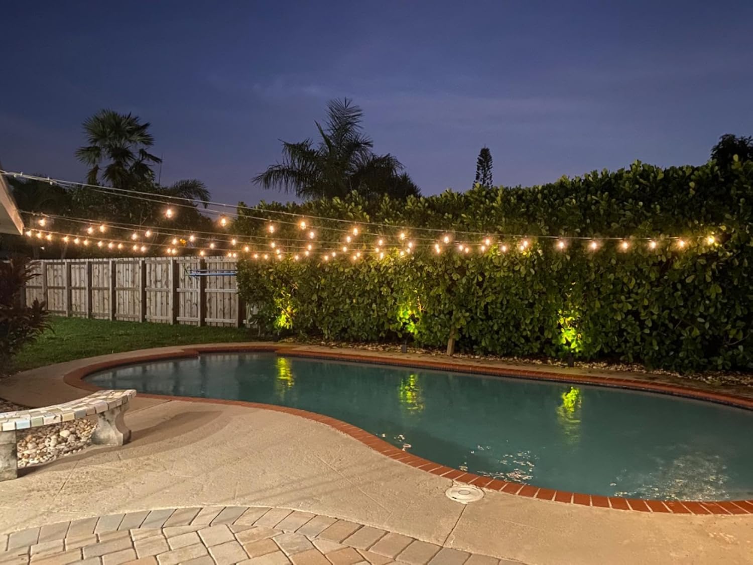 7 String Light Ideas for Fire Pit Pergolas That Create Magical Outdoor Gathering Spaces