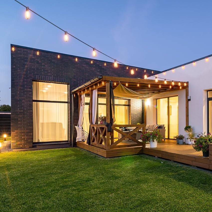 String Lights in Industrial Bedrooms: 7 Ways to Layer Warm Edison Bulbs